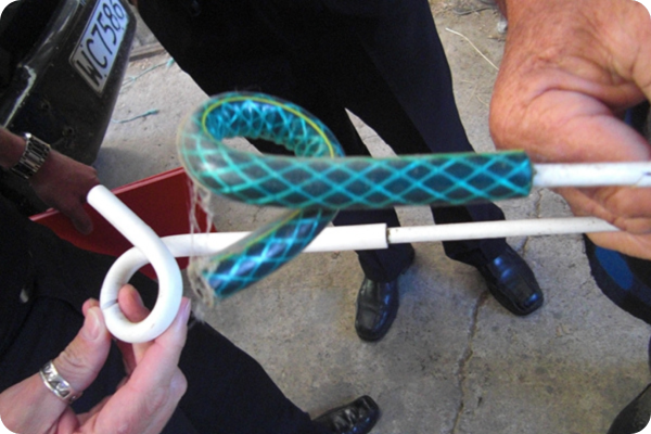 Damaged Ring Top Post with a hose fitted on top of it 